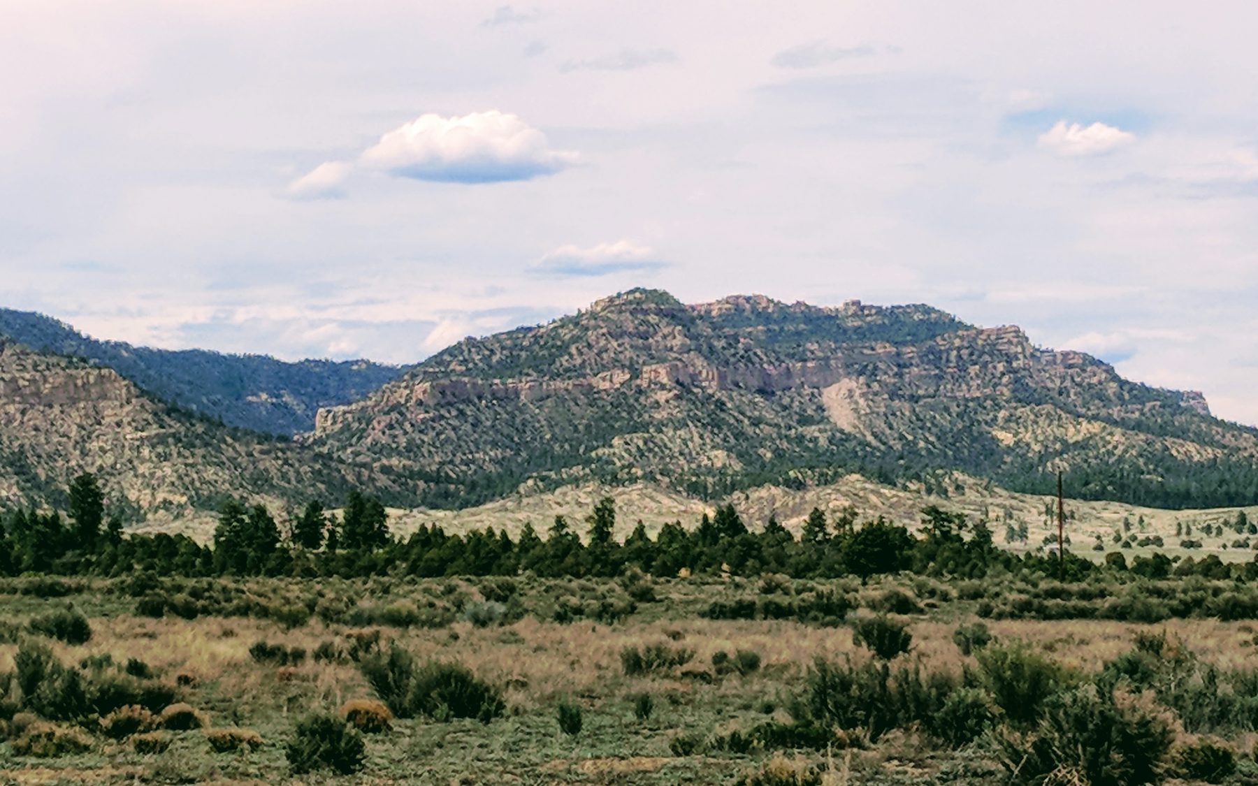 Mesa and mountain country on Gloria a Dios, a ranch sold by John Hayter